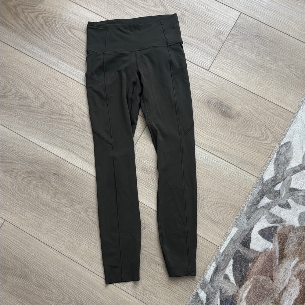 Lululemon olive green 5 pocket High-Waisted fast and free leggings. Size 4